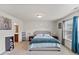 Bedroom with a plush bed, natural light, and soft carpet at 44 Bordeaux Dr, Clayton, NC 27527