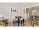Charming dining area with a modern table set, stylish decor, and ample natural light at 44 Bordeaux Dr, Clayton, NC 27527