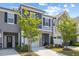 Townhome exteriors showcasing varied siding colors and coordinated landscaping at 44 Bordeaux Dr, Clayton, NC 27527