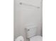 Modern toilet with a chrome towel bar, complemented by a sleek, minimalistic design at 44 Bordeaux Dr, Clayton, NC 27527