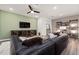 This stylish living room is equipped with designer furnishings and a contemporary entertainment center at 5000 Reader Way, Durham, NC 27703