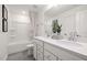 Stylish bathroom with dual sinks, modern white vanity, and a shower-tub combination at 5010 Reader Way, Durham, NC 27703