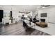 Open-concept living area with hardwood floors and plenty of room for both living and dining at 5010 Reader Way, Durham, NC 27703
