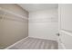 Spacious walk-in closet with carpeted floor and wire shelving for ample storage solutions at 5010 Reader Way, Durham, NC 27703
