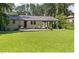 Well-maintained yard with a covered patio and plenty of green space at 509 Forest Ridge Rd, Garner, NC 27529