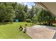 Large backyard featuring a spacious grass yard and an outdoor shed at 509 Forest Ridge Rd, Garner, NC 27529