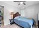 Inviting bedroom featuring a ceiling fan, natural light, and neutral paint scheme at 509 Forest Ridge Rd, Garner, NC 27529