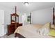 Comfortable bedroom with a four-poster bed and natural lighting at 509 Forest Ridge Rd, Garner, NC 27529