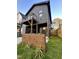 Beautiful home with a second-story porch overlooking the manicured lawn and landscaped front yard at 517 Coleman St, Raleigh, NC 27610