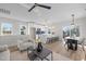 Open-concept living space featuring a modern kitchen, cozy seating area, and dining area at 517 Coleman St, Raleigh, NC 27610