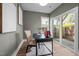 Modern office with neutral paint, lots of natural light, and a door leading to a patio at 517 Coleman St, Raleigh, NC 27610