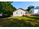 This home features a spacious backyard and a wooden back deck at 518 S Coalport Dr, Apex, NC 27502