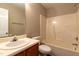 This bathroom features a vanity, toilet, and a shower/tub combo at 518 S Coalport Dr, Apex, NC 27502