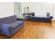 Living room with hardwood flooring and two sofas perfect for entertaining guests at 5304 Cypress Ln, Raleigh, NC 27609