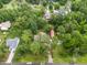 Aerial view showcasing the property's mature landscaping and surrounding neighborhood at 608 20Th St, Butner, NC 27509