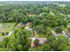 Aerial view of the property, lush greenery, and surrounding community at 608 20Th St, Butner, NC 27509
