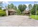 Detached garage with covered parking and basketball hoop at 608 20Th St, Butner, NC 27509