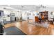 Spacious living room featuring hardwood floors, modern appliances, and ample natural light at 608 20Th St, Butner, NC 27509