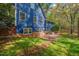 A view of the property shows a brickwork, lawn and building exterior at 6321 Malvern Ln, Hillsborough, NC 27278