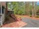 Backyard accessibility ramp and nearby parking for convenience, surrounded by natural beauty at 6321 Malvern Ln, Hillsborough, NC 27278