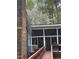 Screened in porch and a ramp for accessibility, perfect for enjoying nature while staying protected from the elements at 6321 Malvern Ln, Hillsborough, NC 27278