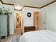 Comfortable bedroom offering ample closet space and a partial bathroom view at 6760 Keansburg Rd, Gibsonville, NC 27249