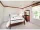 Comfortable bedroom offering a bright window and decor at 6760 Keansburg Rd, Gibsonville, NC 27249