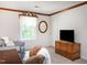 Bedroom showcasing neutral walls, a large window, and comfortable seating at 6760 Keansburg Rd, Gibsonville, NC 27249
