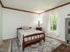 Cozy bedroom with a bed, an area rug, and natural light at 6760 Keansburg Rd, Gibsonville, NC 27249