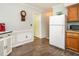 A well-lit kitchen area shows modern appliances with bright walls and trim at 6760 Keansburg Rd, Gibsonville, NC 27249