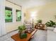 Cozy living room with natural light, comfortable seating, and tasteful decor for a welcoming ambiance at 6760 Keansburg Rd, Gibsonville, NC 27249