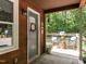 Inviting front porch with a sitting area and a view of the surrounding landscape at 6760 Keansburg Rd, Gibsonville, NC 27249