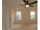 Bedroom featuring a ceiling fan, recessed lighting, and two windows providing outdoor views at 6973 Doddridge Ln # 17, Cary, NC 27519