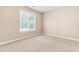 Bedroom boasts carpet floor and a large window with natural light at 7021 Oviedo Dr, Raleigh, NC 27603