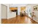 Open concept living area with hardwood floors, and dining nook at 7021 Oviedo Dr, Raleigh, NC 27603