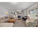 Inviting living room with fireplace, hardwood floors, and comfortable seating, perfect for relaxing at 7042 Us 401 Highway N, Fuquay Varina, NC 27526