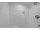 Modern shower interior featuring sleek white tiles and contemporary fixtures for a spa-like feel at 7042 Us 401 Highway N, Fuquay Varina, NC 27526
