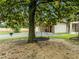 Playful backyard featuring mature trees and swing set at 7042 Us 401 Highway N, Fuquay Varina, NC 27526