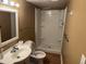 A clean, functional bathroom features a walk-in shower at 709 Gerard St, Durham, NC 27701