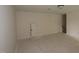 Spacious basement with a small door for storage or utilities at 7102 Hubner Pl # 46, Cary, NC 27519