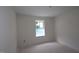 The bedroom offers a window that provides natural light and outdoor views at 7102 Hubner Pl # 46, Cary, NC 27519