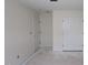 Bedroom with double doors and a single door providing ample closet space and accessibility at 7102 Hubner Pl # 46, Cary, NC 27519