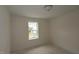 Sunlit bedroom with view from the window at 7104 Hubner Pl # 45, Cary, NC 27519