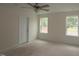 Bedroom with recessed lighting and two windows providing natural light at 7104 Hubner Pl # 45, Cary, NC 27519