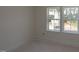 Bright bedroom featuring double windows offering an outdoor view at 7106 Hubner Pl # 44, Cary, NC 27519