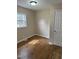This bedroom offers a cozy retreat with a window for natural light and ample electrical outlets at 726 Thompson St, Pittsboro, NC 27312