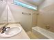 Well-lit bathroom with a sink, vanity, and a tub/shower combo at 8116 Reynard Rd, Chapel Hill, NC 27516