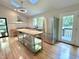 Bright kitchen features a skylight, stainless appliances and a butcher block island at 8116 Reynard Rd, Chapel Hill, NC 27516