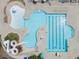 Aerial view of a sparkling community pool with a slide, swimming lanes, and plenty of lounge chairs at 821 Rambling Oaks Ln, Holly Springs, NC 27540