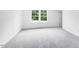 Bedroom with lots of natural light and light carpet at 8763 Wardle Ct, Wake Forest, NC 27587